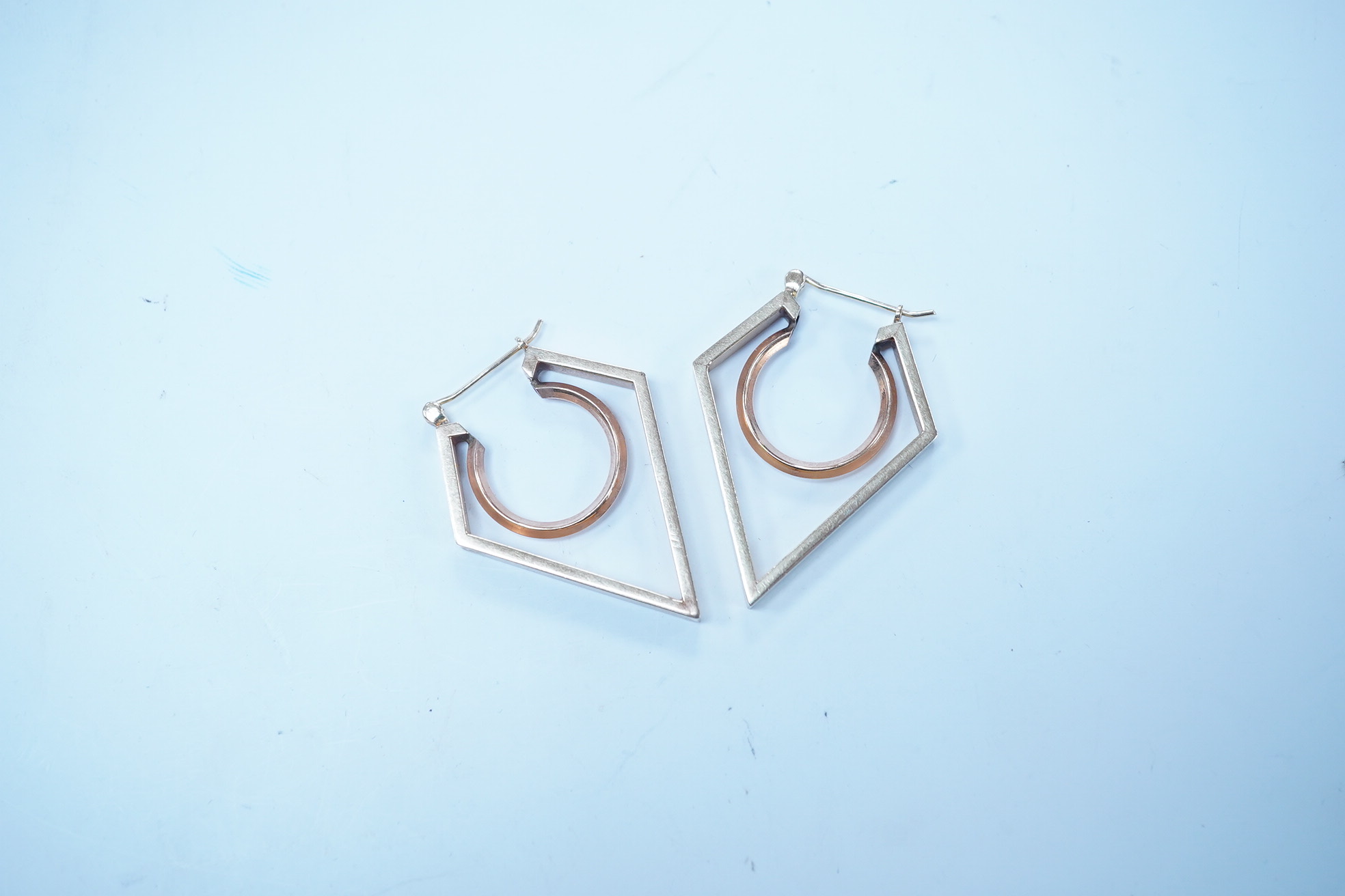 A modern pair of two colour yellow metal geometric earrings, 38mm, 5.7 grams. Condition - fair to good